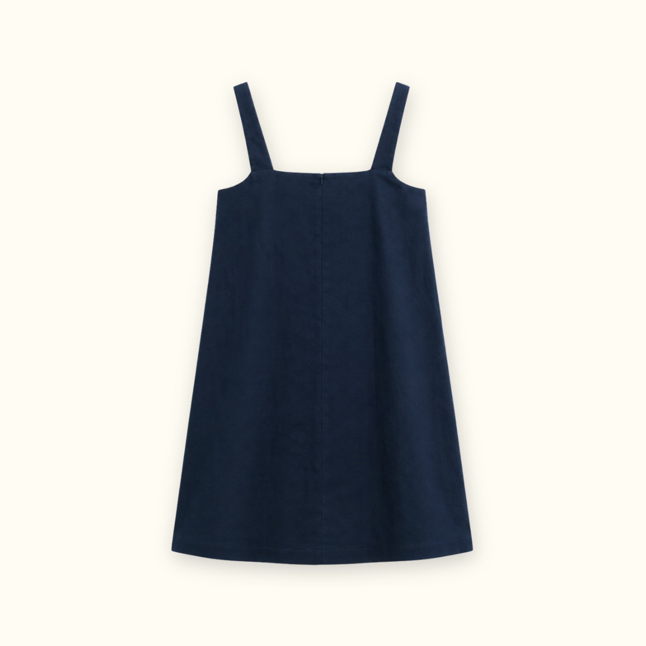 Vestido mini de lino en azul marino, vista trasera, mostrando el escote y la silueta del vestido
