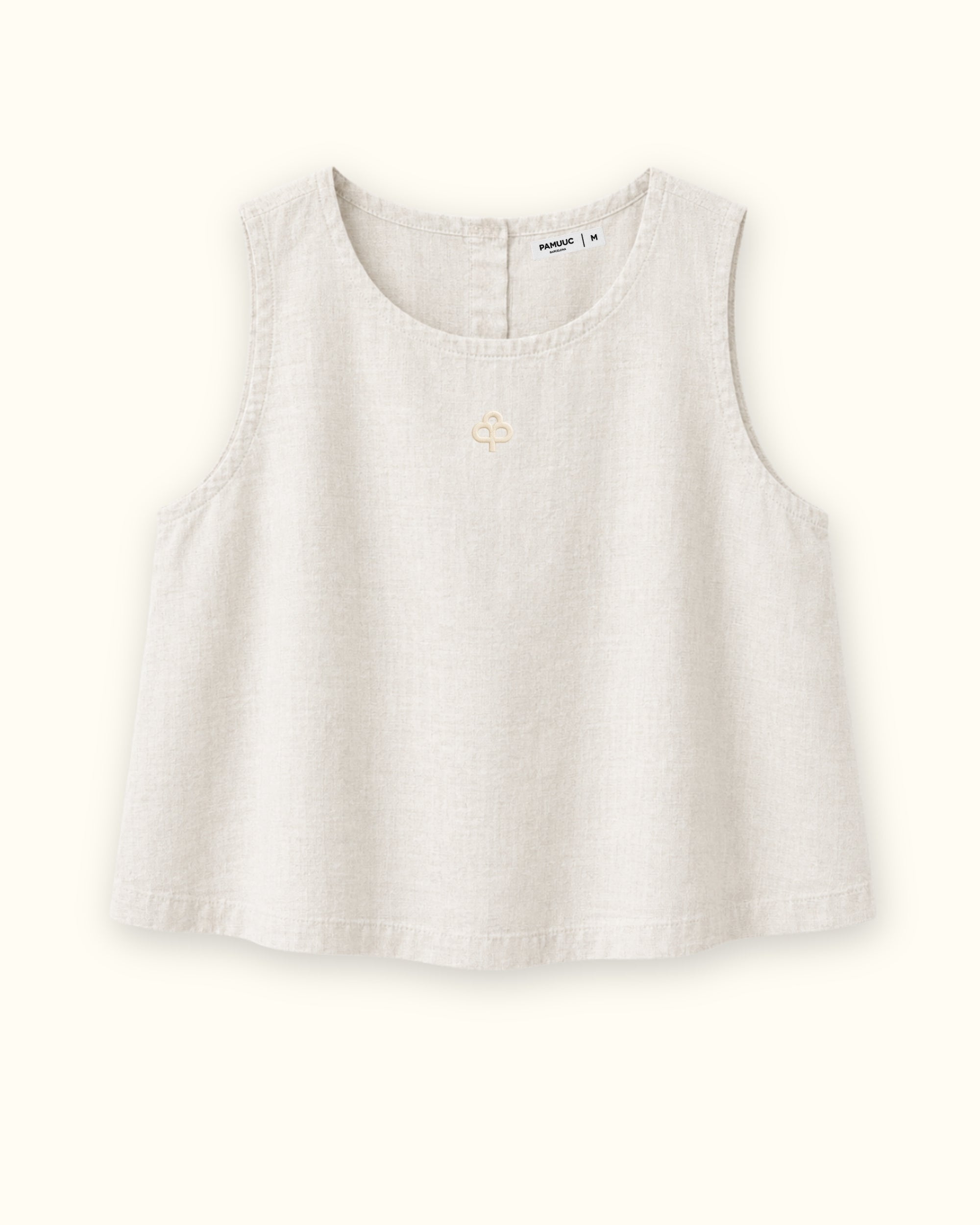 Top en lin sans manches off white, vue de face, montrant l’encolure et la coupe sans manches