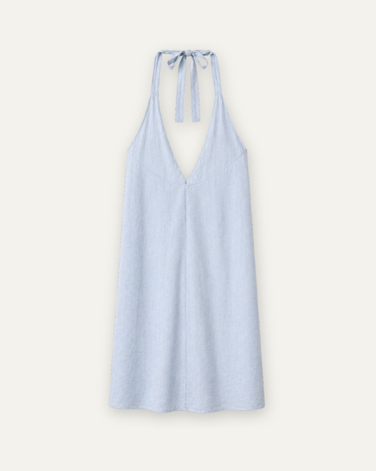 Robe halter en lin bleu clair, vue de dos, montrant l’encolure et la silhouette de la robe