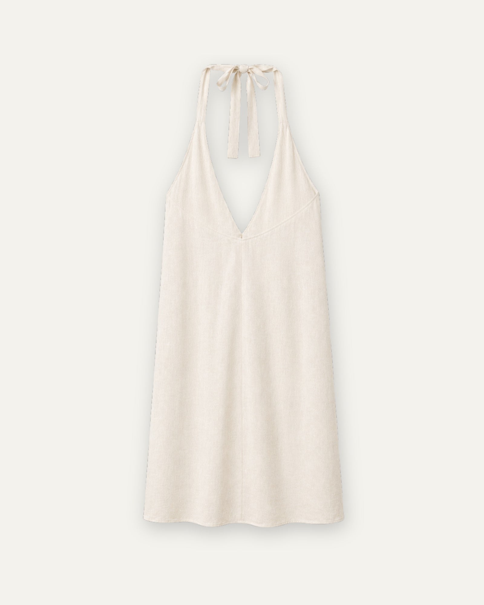 Robe halter en lin off whitee, vue de dos, montrant l’encolure et la silhouette de la robe