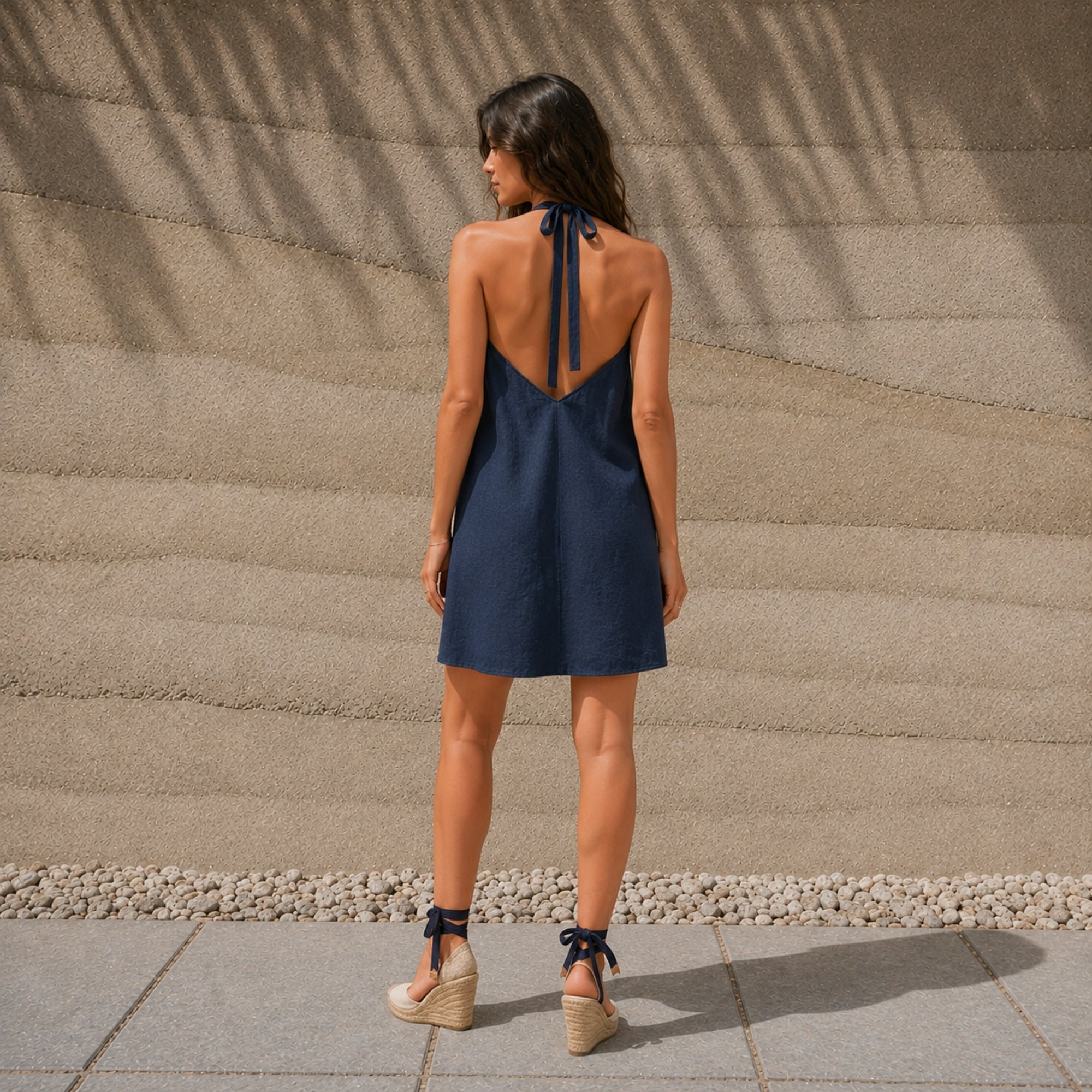 Linen Halter Dress in Navy Blue, lifestyle view 4, showing neckline and dress silhouette