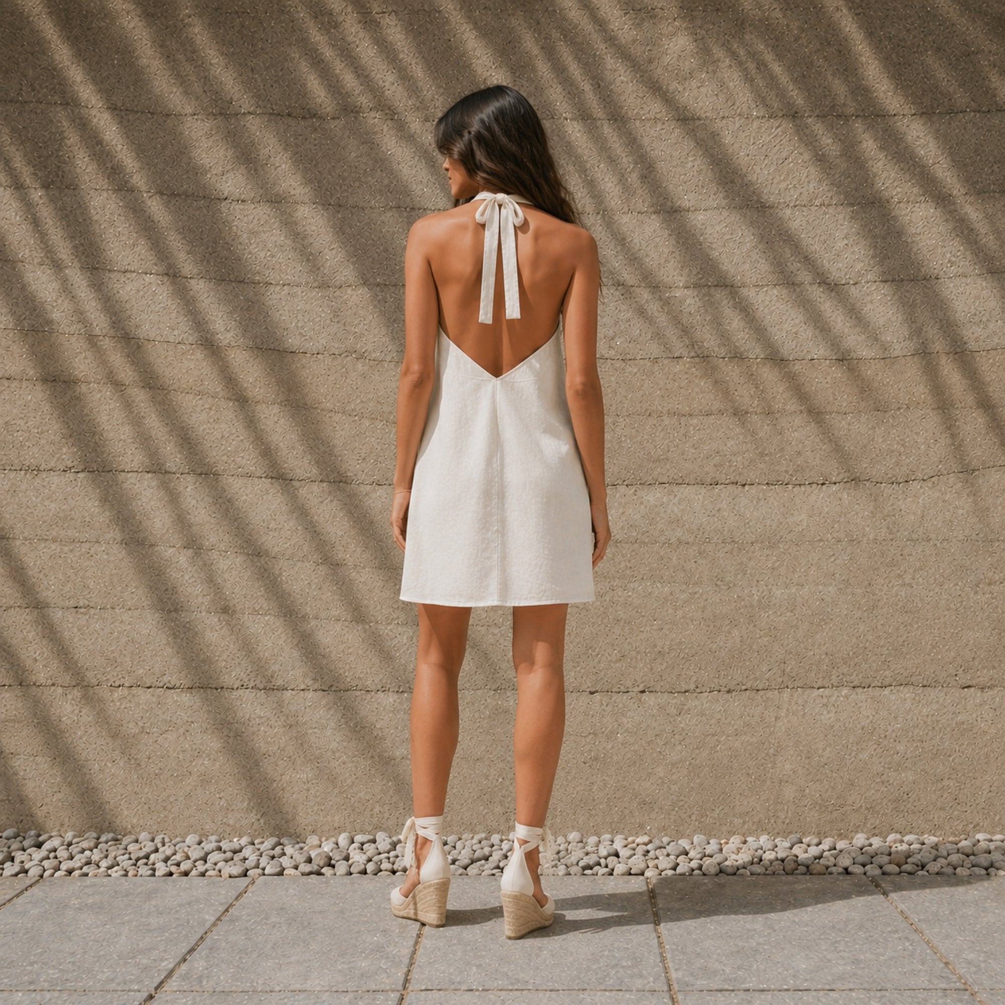 Linen Halter Dress in Off White, lifestyle view 4, showing neckline and dress silhouette