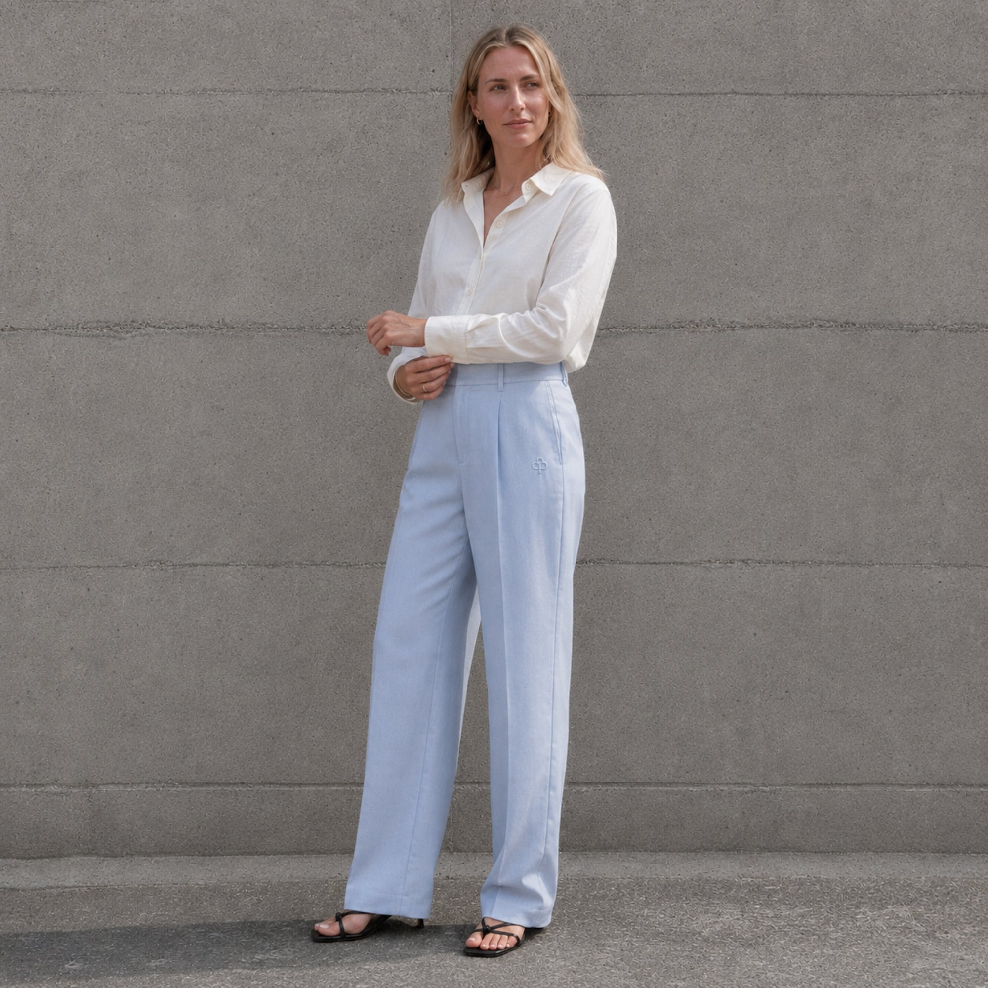 Straight Leg Linen Pants in Light Blue, lifestyle view 3, showing pleats and straight leg shape
