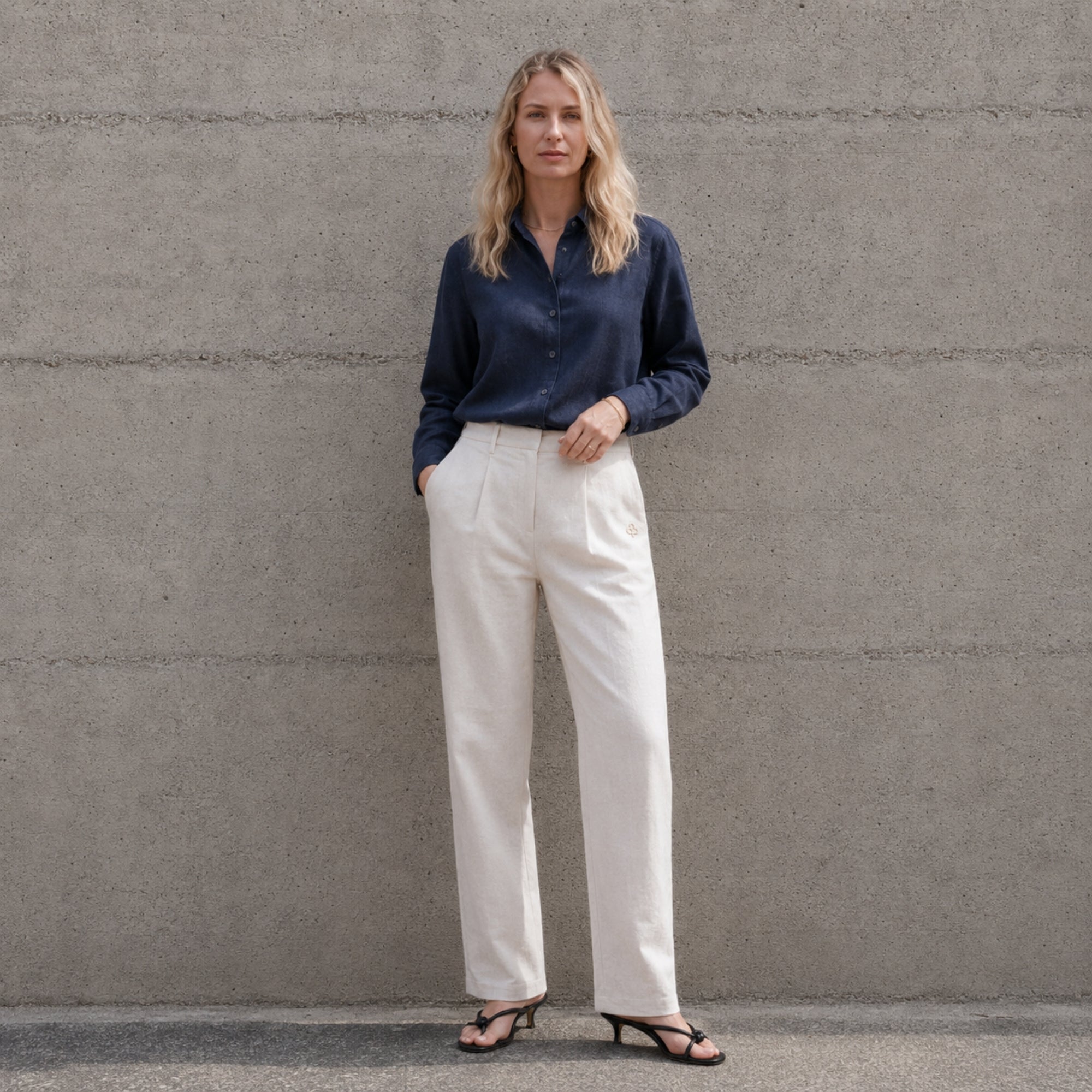 Straight Leg Linen Pants in Off White, lifestyle view 1, showing pleats and straight leg shape