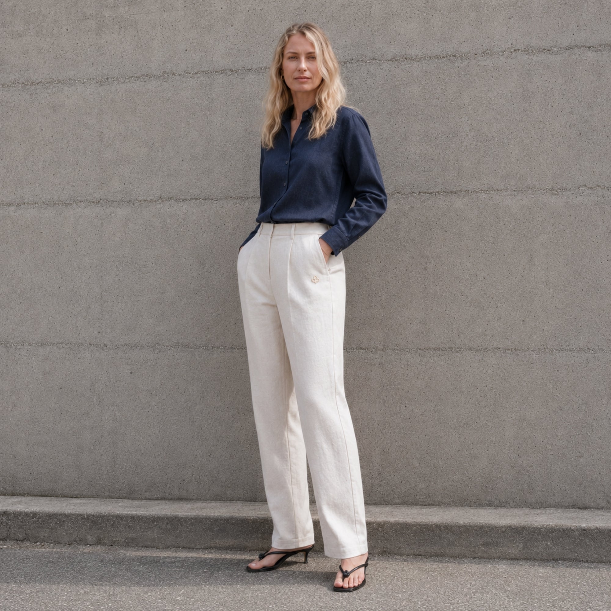 Straight Leg Linen Pants in Off White, lifestyle view 3, showing pleats and straight leg shape